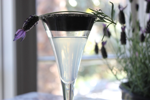 Vegan Lavender Martini with lavender sprig for garnish